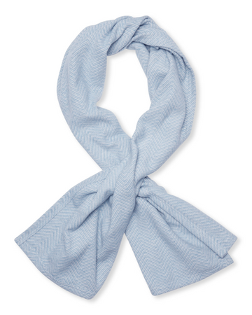 Light blue shawl with herringbone weave pattern displayed flat in a crossed formation.4