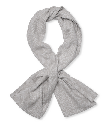 Light grey shawl with herringbone pattern, draped and knotted in center.7