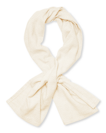 Cream-colored shawl with herringbone weave pattern, tied in a knot at center.4