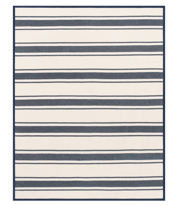 Navy and cream striped blanket with textured woven pattern and navy border.7
