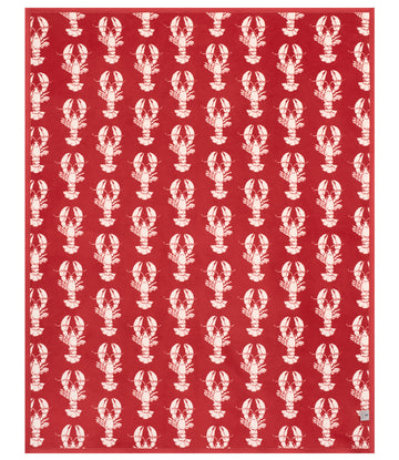 Red blanket with repeating white lobster pattern throughout.8