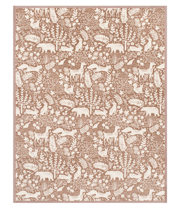 Tan and cream blanket with repeating forest animals, plants, and botanical elements in an all-over pattern.6